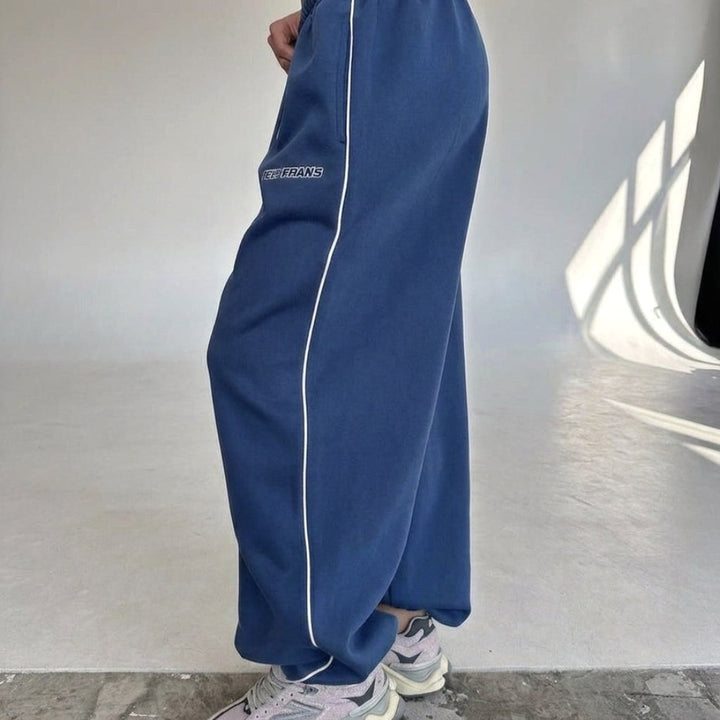 Maelle | Women's Baggy-Fit Sweatpants with Side Stripe, Wide-Leg Lounge Trousers | Everlasting Boutique | Pink